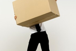 man holding moving box