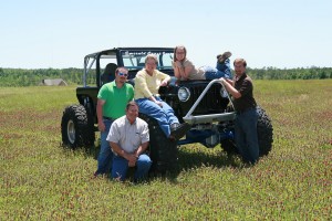  a family riding a tractor on a farm