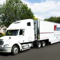 Wheaton World Wide Moving Truck at House