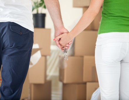 Couple holding a key