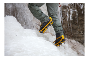 Person climbing with microspikes