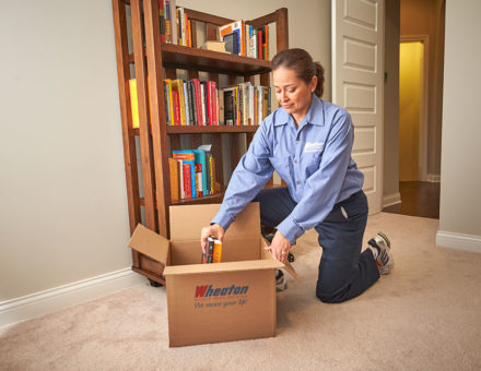 wheaton worker packing books