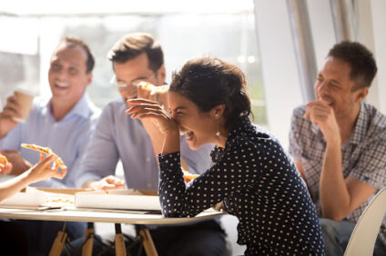 Coworkers laughing together.