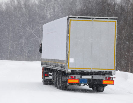 moving truck on winter road
