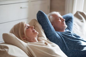 couple reclining on a couch