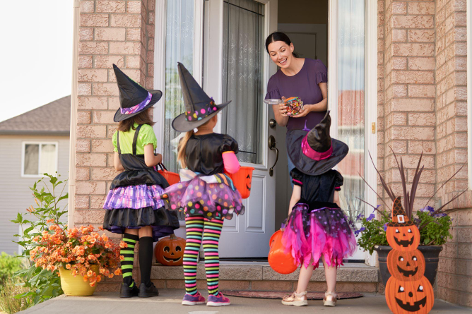 Handing out Halloween candy