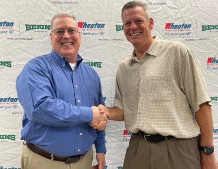 Kevin Miller shakes hands with Ron Borkowski