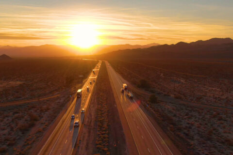 A long road at sunset.