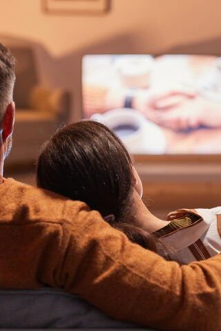 Couple watching a movie.