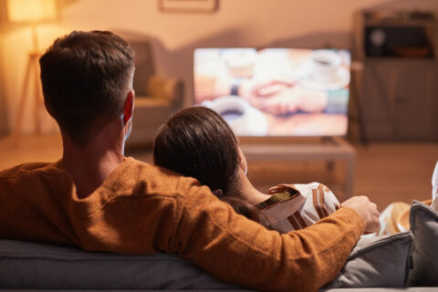 Couple watching a movie.