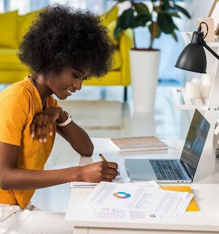 A woman working on her latop.