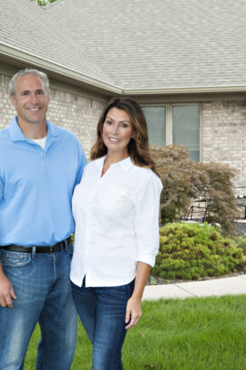 Wheaton Couple in Front of House