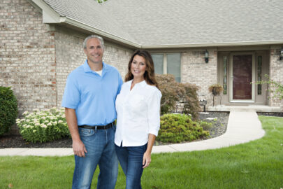 Wheaton Couple in Front of House