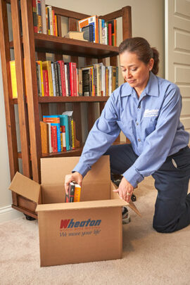 wheaton worker packing books