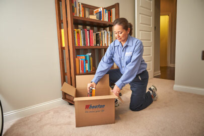 wheaton worker packing books