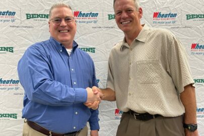 Kevin Miller shakes hands with Ron Borkowski