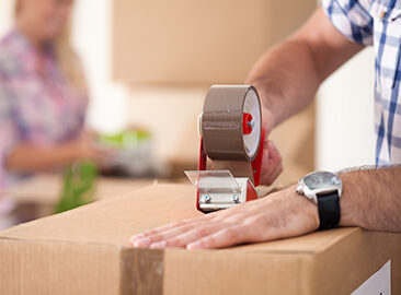 packing a box with tape