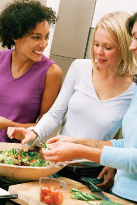 Neighbors making salad