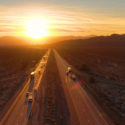 A long road at sunset.