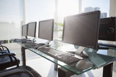 row of desktop computers