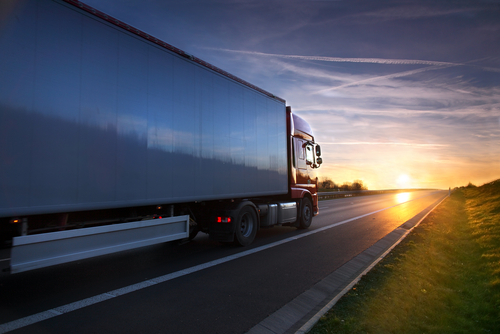 truck driving down road