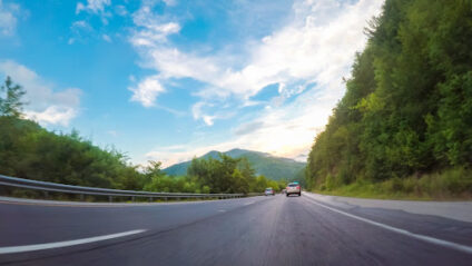 Empty road with a blue sky.