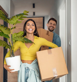 A couple moving out of their home.