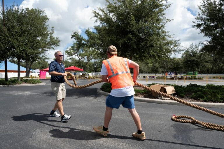 Central Moving & Storage president Jason Fontaine sets up rope for Florida truck pull