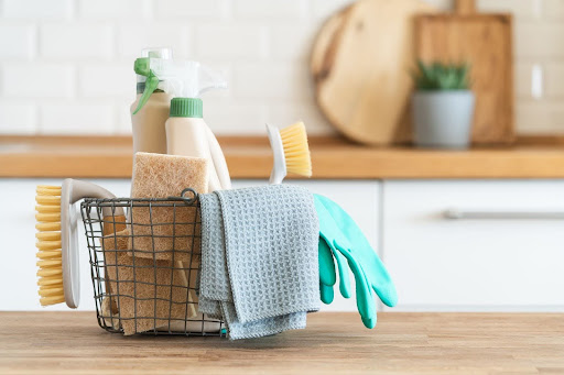 Basket of cleaning supplies.